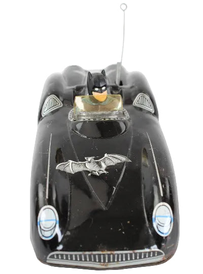 Black Batmobile toy on a white background