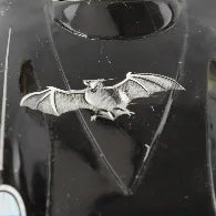 Black Batmobile toy on a white background