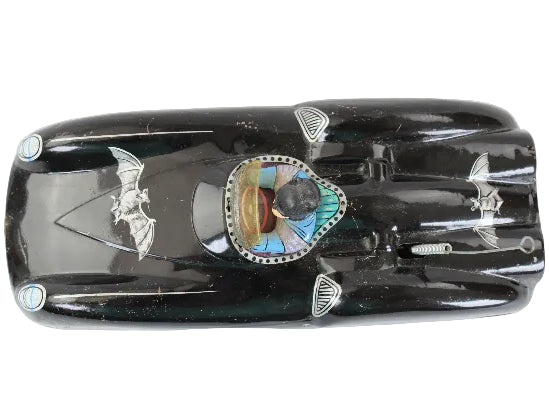 Vintage toy car with detailed design on a white background