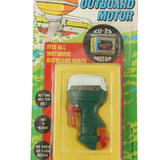 Vintage Outboard Motor toy in packaging on a white background