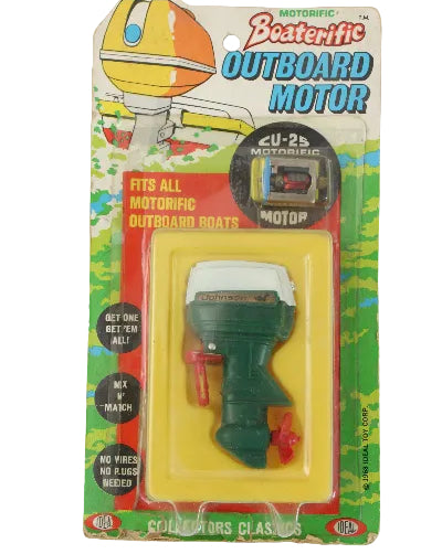 Vintage Outboard Motor toy in packaging on a white background