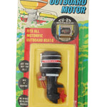 Vintage toy outboard motor packaging with colorful design on a white background