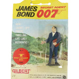 James Bond 007 toy figure packaging with a man in a suit and tie holding a red object.