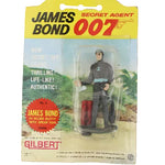 James Bond 007 action figure in packaging with 'Gilbert' branding on a white background