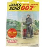James Bond 007 action figure in packaging with 'Gilbert' branding on a white background