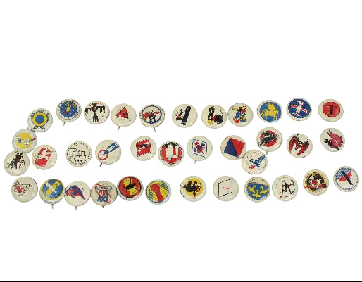 Collection of various buttons with different designs on a white background