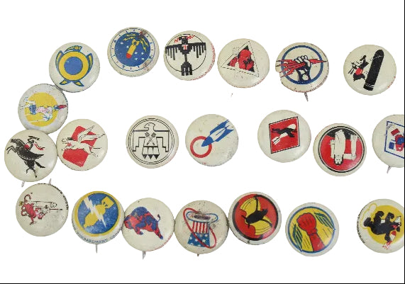 Collection of vintage buttons with various designs on a white background