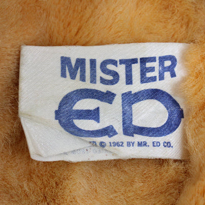 Label with 'MISTER ED' text on a textured brown background
