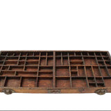 Wooden type tray with multiple compartments on a white background