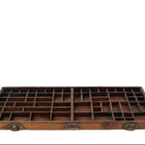 Wooden tray with multiple compartments on a white background