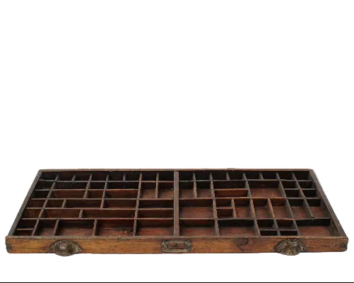 Wooden tray with multiple compartments on a white background
