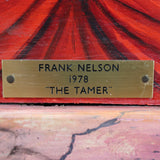 Brass nameplate with 'Frank Nelson 1978 The Tamer' on a red background