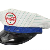 Vintage Coca-Cola cap with a white brim and blue band on a white background
