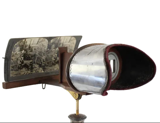 Vintage stereoscope with a glass plate on a white background