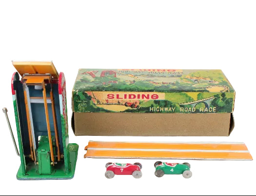 Toy track set with cars and packaging on a white background