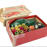 Toy car set with components in a box on a white background