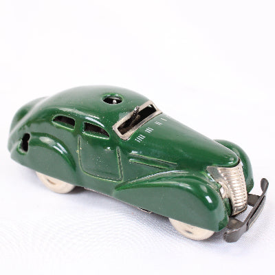 Green toy car on a white background