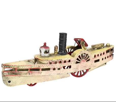 Vintage toy steamboat on a white background