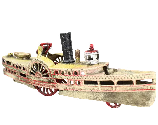 Model of a steamboat on a white background