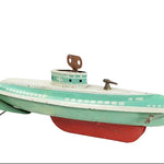 Vintage toy submarine with green body and red bottom on a white background