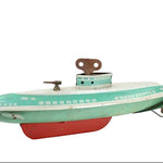 Vintage toy submarine with green body, red bottom, and white top on a white background
