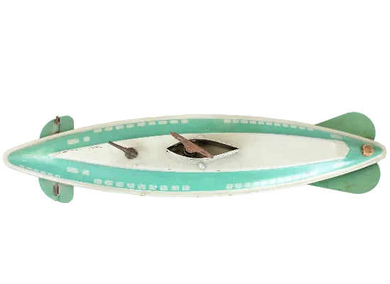 Vintage toy submarine with a green body and white top on a white background
