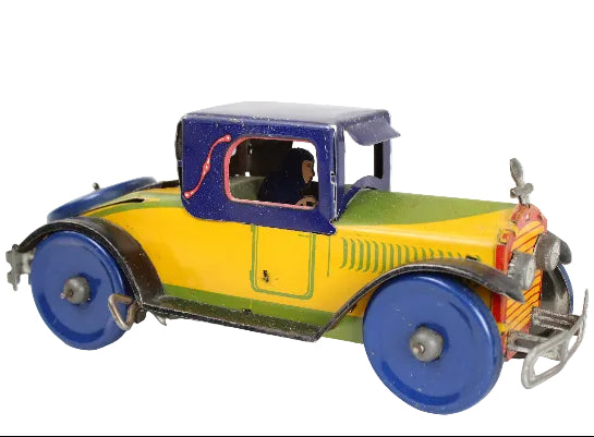 Vintage Louis Marx toy car with a colorful design on a white background