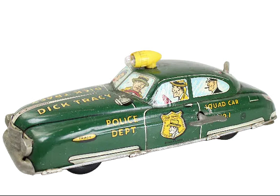 Toy Dick Tracy police squad car with cartoon characters on a white background