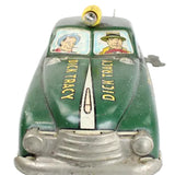 Vintage toy car with 'Dick Tracy' branding on a white background