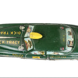 Vintage toy police car from the Dick Tracy series on a white background