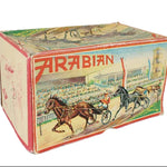 Vintage toy box with 'Arabian' branding and horse-drawn carriage illustration on a white background