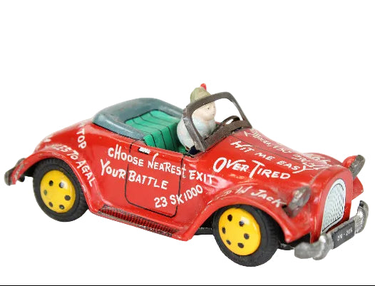 Red toy car with text and a small figure inside on a white background