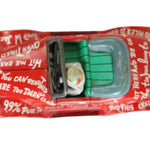 Toy car with a red box labeled 'Over The Top Tire Co.' on a white background