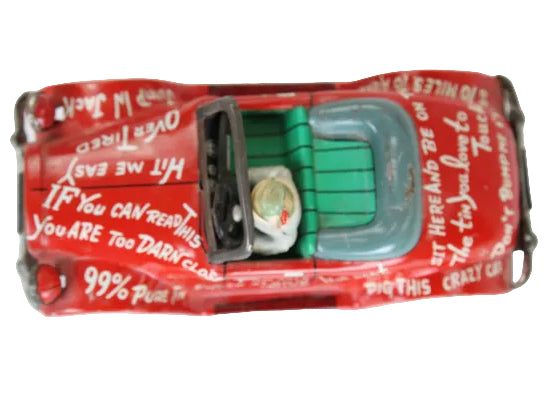 Toy car with a red box labeled 'Over The Top Tire Co.' on a white background