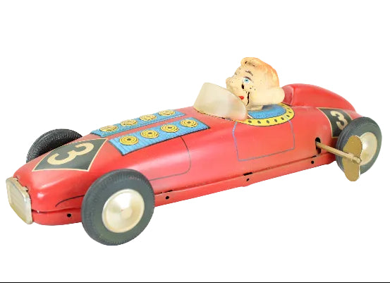 Toy race car with Howdy Doody inside on a white background