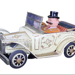 Toy car with a character in a top hat on a dark background