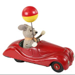 Toy car with a mouse driver and balloon on a white background