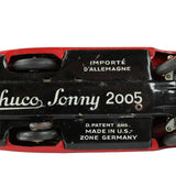 Back view of a Schuco Sonny 2005 toy car with branding and text on a white background