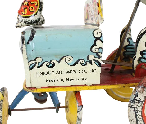 Vintage toy cart with colorful design and 'Unique Art Mfg. Co., Inc.' branding on a white background