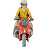 Toy figure of a person on a red motorcycle with a white background