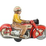 Model of a man riding a red motorcycle on a white background