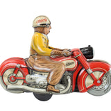 Model of a man riding a red motorcycle on a white background