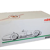 Model car packaging box with a race car illustration and Marklin branding on a dark background
