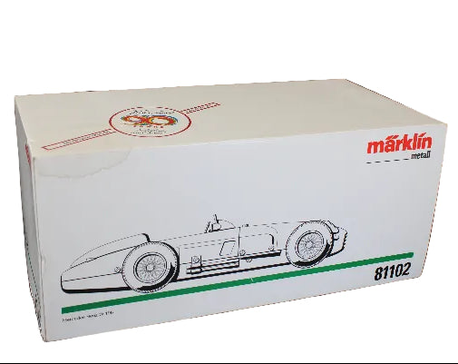 Model car packaging box with a race car illustration and Marklin branding on a dark background