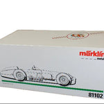 Model car box with Marklin logo and race car illustration on a dark background