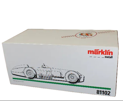 Model car box with Marklin logo and race car illustration on a dark background