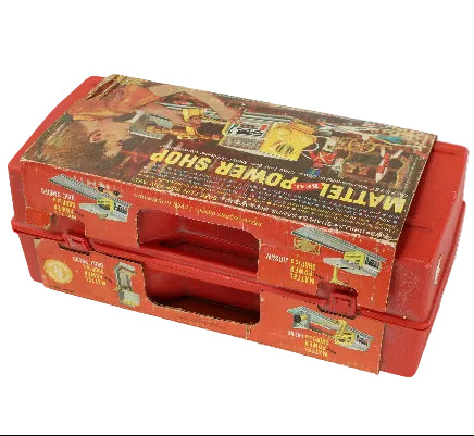 Toy toolbox with a colorful label on a white background