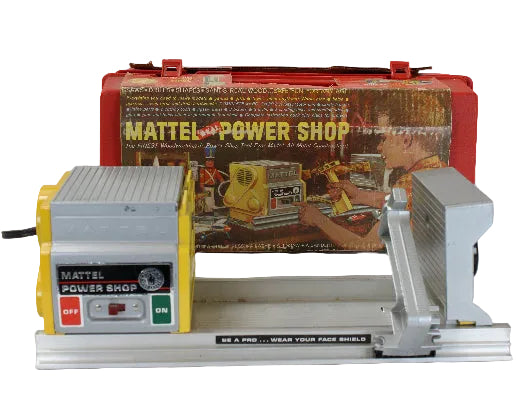 Mattel Power Shop toy set with machine and packaging on a white background
