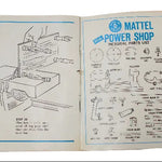 Open book with illustrations and text on a Mattel Power Shop Pictorial Parts List on a white background.