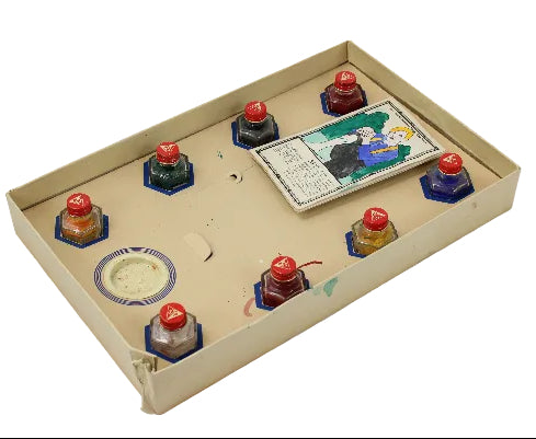 Vintage-style game board with inkwell-like objects on a white background